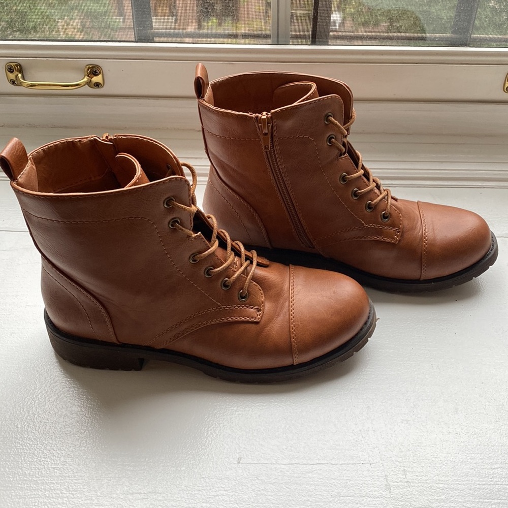 Tan lace up lug sole boots